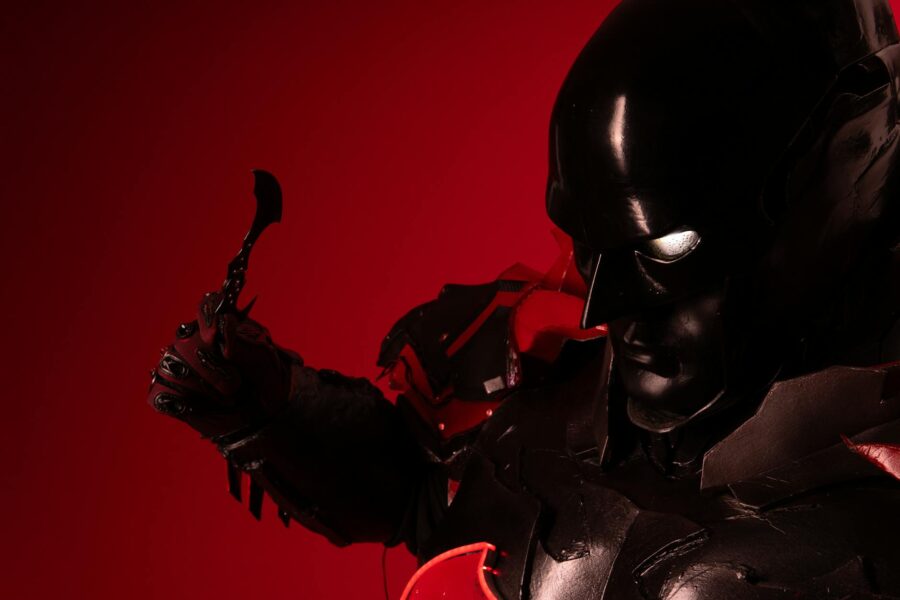 Movie villain actor close dark background