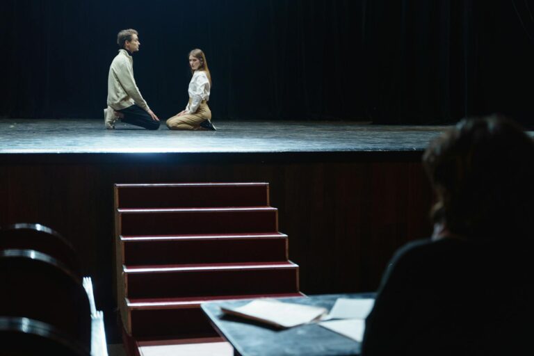 Actor rehearsal stage shadow film set director actor