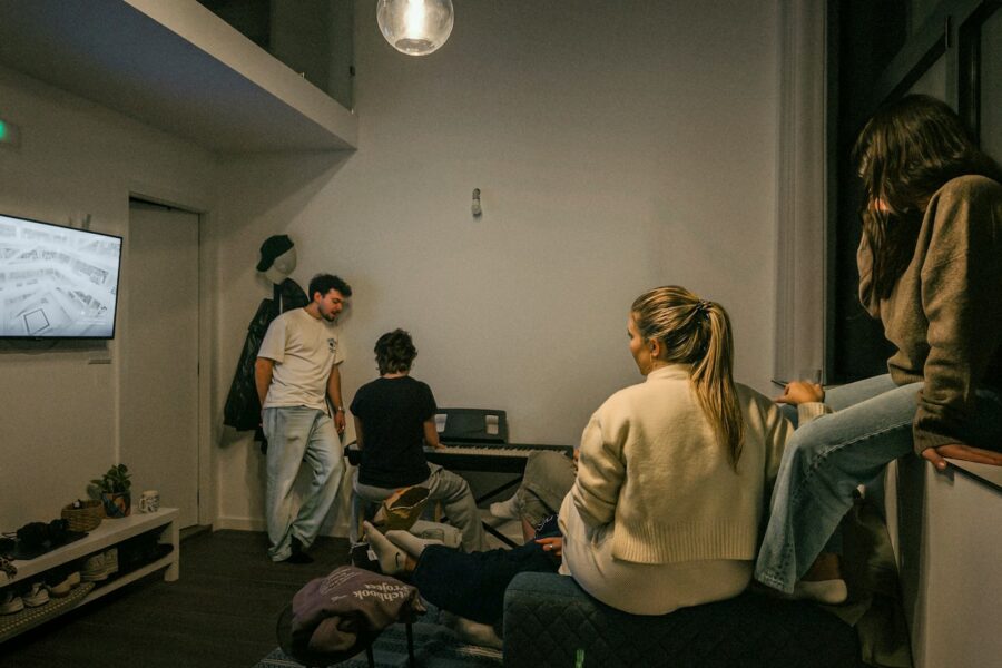 Friends watching movie living room popcorn